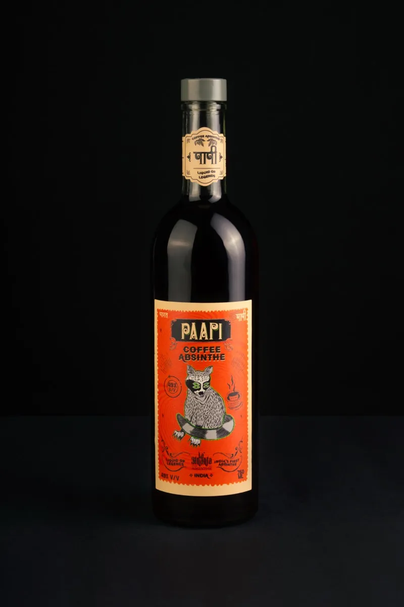 A bottle of Paapi Coffee Absinthe against a black background